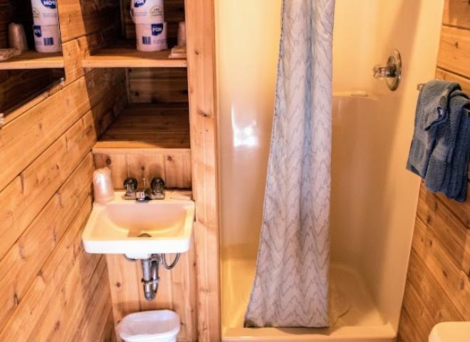 Small bathroom with a shower stall.