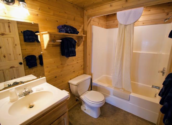 Bathroom with a standard tub/shower.