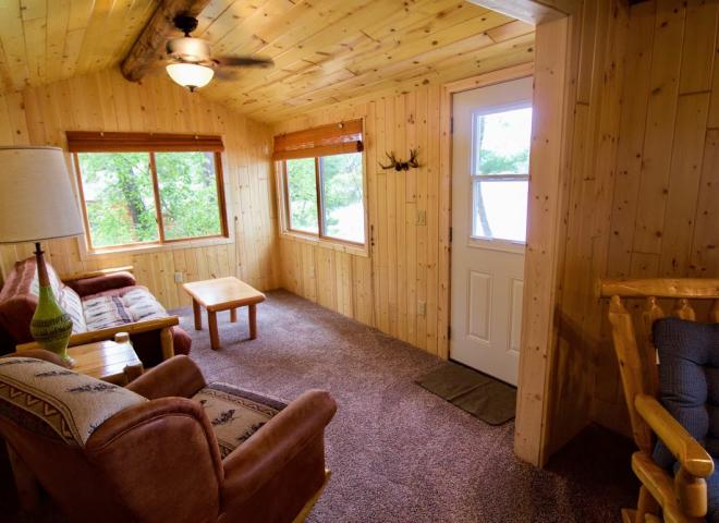 Living area with a futon and chair.