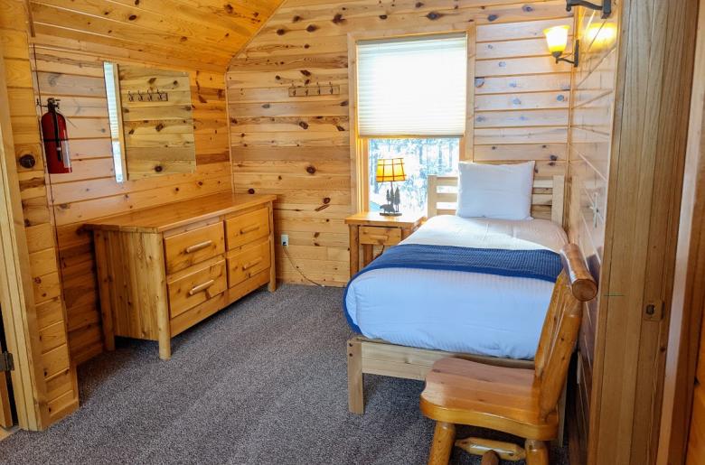 Loft area with a twin bed.