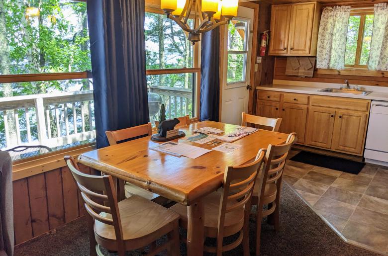 Dining room with seating for 6 and views of the lake.