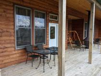 Deck entrance with seating.